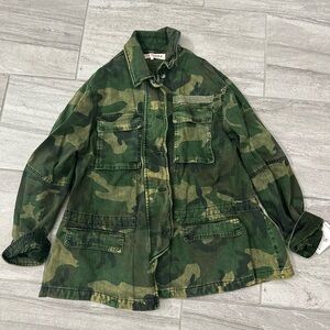 Over sized size sm free people camo jackets with drawstrings. Never worn w/ tags
